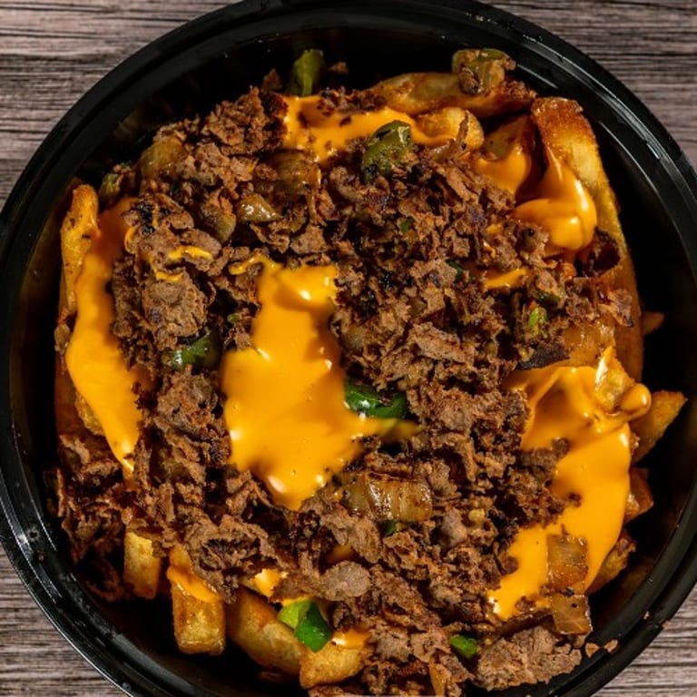 Indulge in Our Cheesesteak